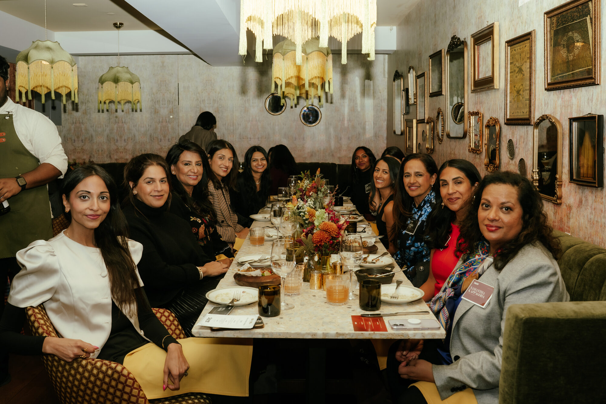 Members around the table at an On the Table dinner